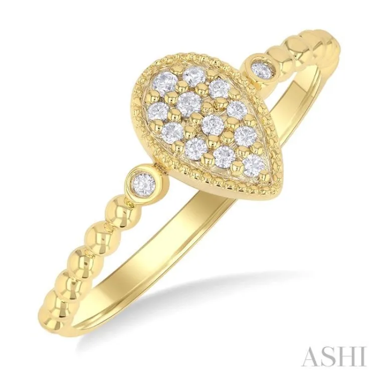 1/8 Ctw Petite Bead Shank Pear Shape Center Round Cut Diamond Fashion Ring in 10K Yellow Gold